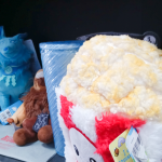 A shelf of stuffed animals.