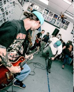 Combust performing live at the Mystery Shop, Oxnard, CA, July 15, 2025.